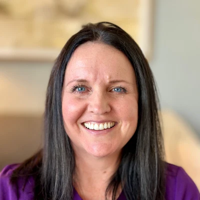 A headshot photo of Stephanie Gaona, the clinic manager at Ocotillo Chiropractic