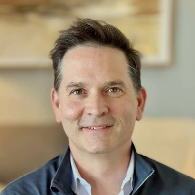 A headshot of Dr. Zsolt Egey-Samu, a chiropractor and owner at Ocotillo Chiropractic